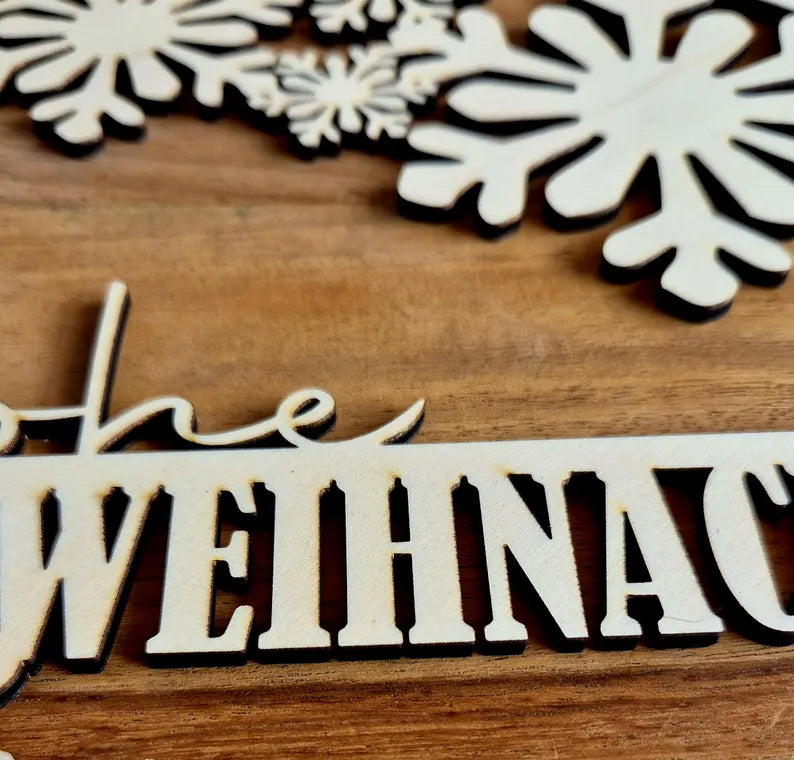 Türkranz mit Schneeflocken Frohe Weihnachten aus Holz